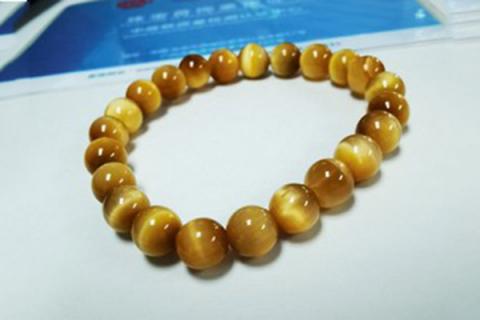 金虎眼石的功效与作用 金虎眼石的功效与作用佩戴禁忌